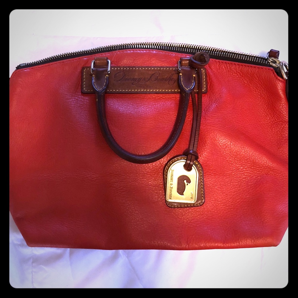 Red leather Dooney & Bourke purse.